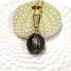 Carved Tahitian pearl pendant necklace